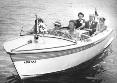 historic picture of group of people boating to Bridal Cave